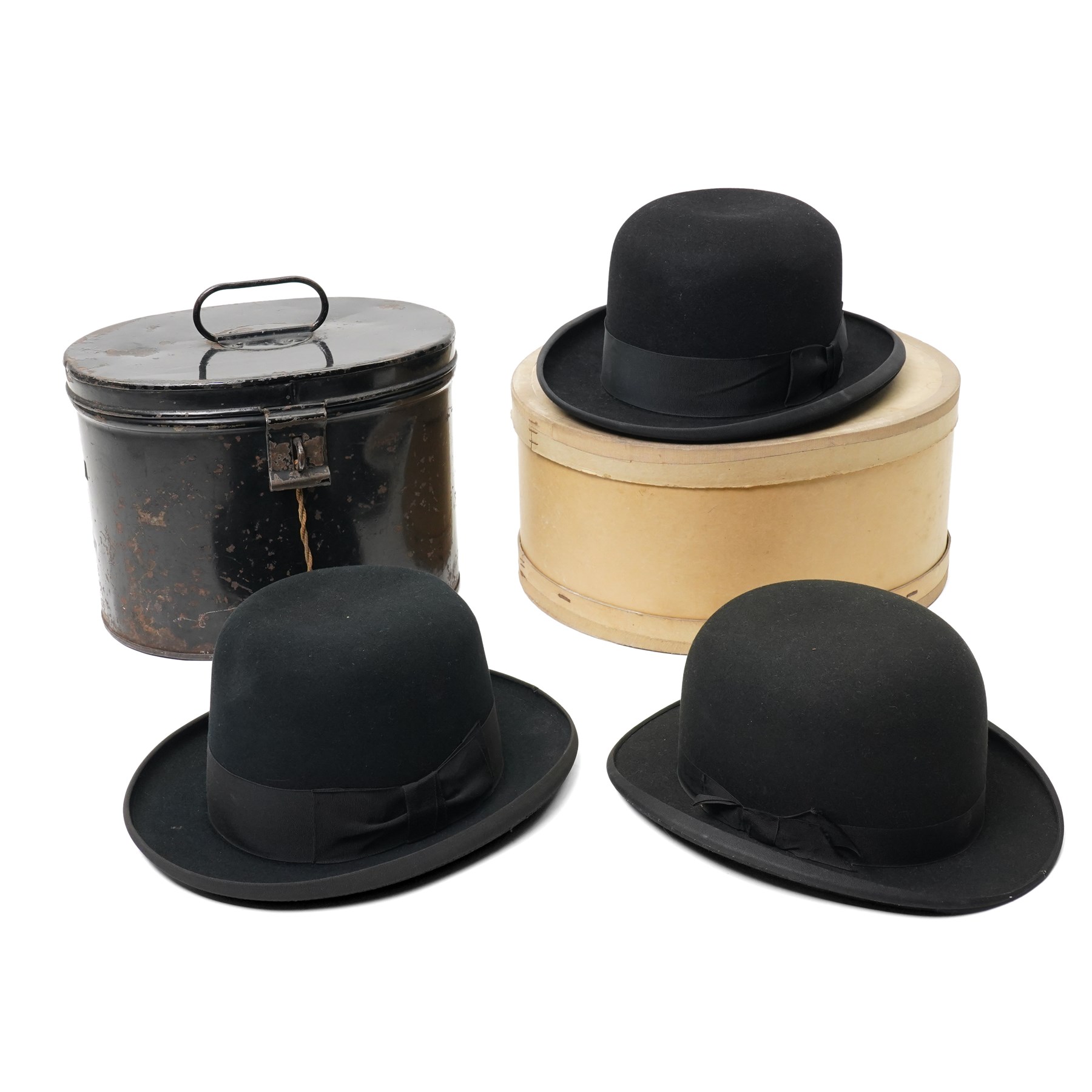 Three bowler hats and two cases, by Tress & Co, Lincoln Bennett & Co, and Christys' (3)