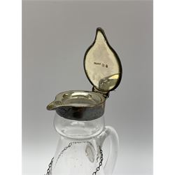 Edwardian silver mounted whisky noggin, of tapering cylindrical form with hinged flat cover, H12cm, together with a silver whisky label, each hallmarked H B Johnson & Co, London, whisky noggin dated 1906, label 1910