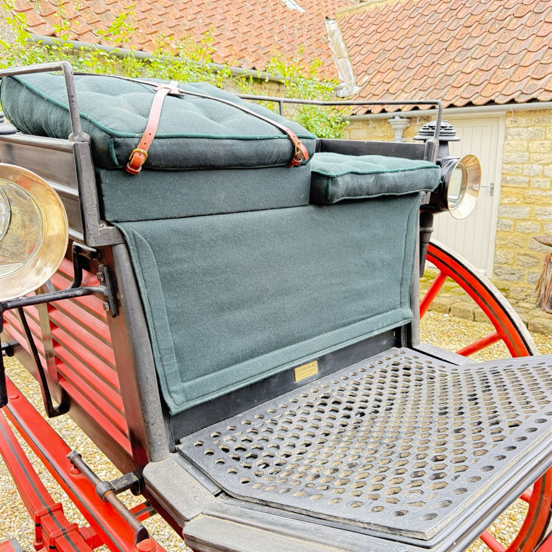 Holland & Holland Tandem Cart - Althorp Spencer Family Estate

A two wheeled tandem cart or cocking cart by Holland & Holland Coach Builders, London, with black painted bodywork, red painted shafts and running gear, red wooden spoked wheels with rubber tyres, green upholstered seating and a rear perforated metal footboard. The cart is fitted with carriage lamp brackets (lamps next lot), green buttoned cushions with leather retaining straps, side louvered body panels, footrests, leaf spring suspension and shafts for horse use. The carriage incorporates an adjustable body position, operated by a lever, allowing the body to be moved forwards or backwards to alter the weight distribution. Formerly owned by the family of Lady Diana Spencer,
Sympathetically conserved by Woods of Fairbourne Carriages Ltd, Kent.

Features:
• Brass maker’s plaque for Holland & Holland Coach Builders, London
• Two wheeled tandem cart
• Black painted body with red painted shafts and running gear
• Red wooden spoked wheels with rubber tyres
• Green upholstered cushions with leather retaining straps
• Adjustable carriage body for weight distribution
• Lever operated adjustment mechanism
• Perforated rear footboard
• Side footrests
• Louvered side panels
• Leaf spring suspension
• Rear opening storage compartment
• Decorative painted armorial motif to rear panel
• Fitted carriage lamps shown, not included in the lot (available as next lot)
• Conserved by Fairbourne Carriages Ltd
• Provenance: The Althorp Attic Sale including The Spencer Carriages, lot 195, 7 July 2010

Dimensions:
Overall length 396 / 198cm
Width 155cm
Height 190cm

Wheel Diameters:
Wheels: 148cm

Seating:
Driving seats: 2
Passenger seats: 2