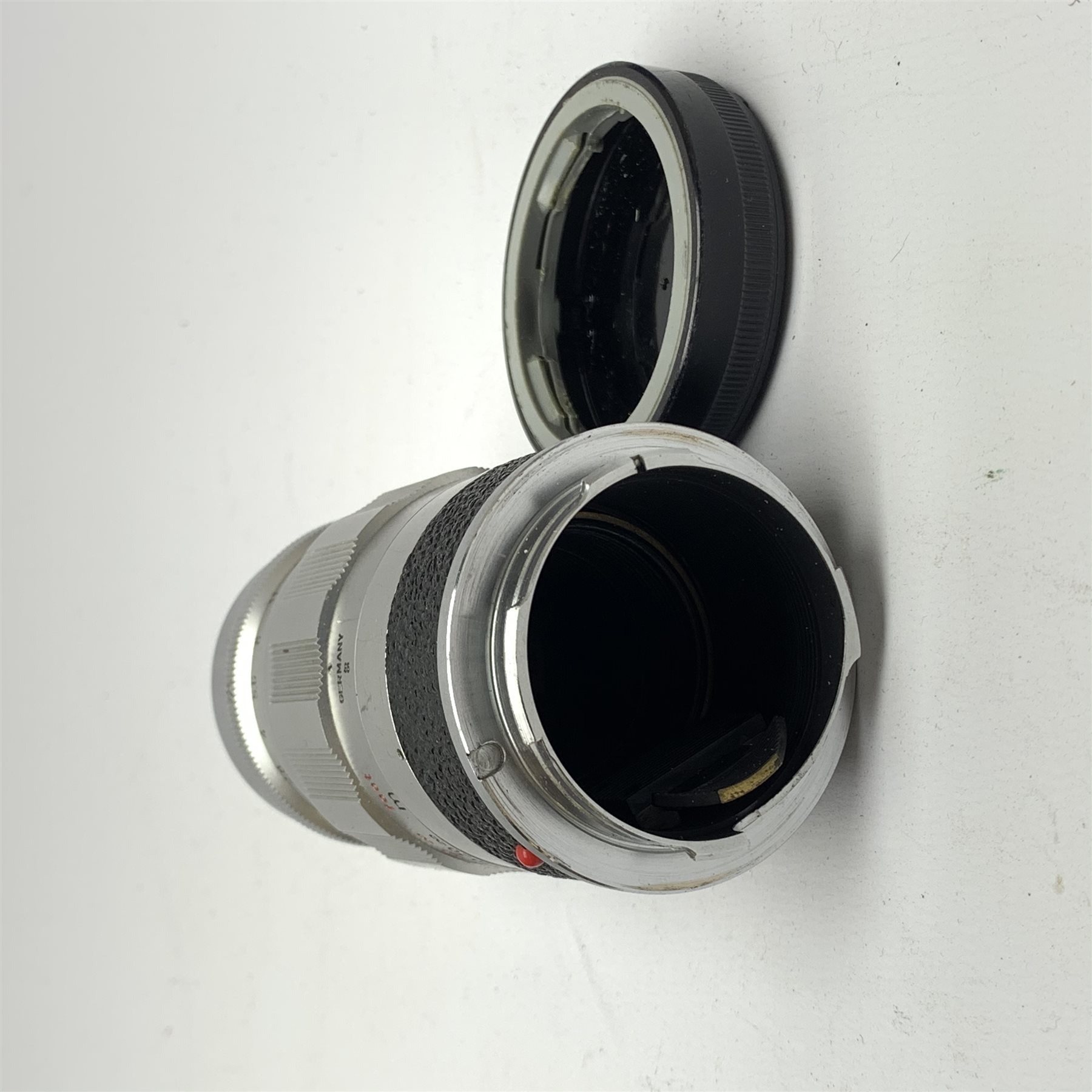 Leica M2-1013180 camera fitted with Leica Summicron 1:2/50 Leitz Wetzlar lens (1764800) and UVa filter, and Leica-Meter MR in leather case together with; Leica Elmarit 1:2.8/90 LW lens (1805634), Leica Summaron 1:28/35 LW lens (1782507), Leica M3 M2 adapter ring, Leica filters yellow and orange cased, three Leica lens hoods IUFOO, IROOA and 12585H (boxed), Leica pocket book, guide and 1960s survey catalogue & price guide leaflet, with original M2 camera box