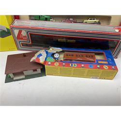 Hornby '00' gauge - Thomas the Tank Engine and Friends 0-6-0 tank locomotive No.1 with Annie and Clarabel coaches; all boxed; Breakdown Pack, Car Transporter Pack, Fuel Tanker Pack and Automatic Level Crossing; all boxed; Lima Car Transporter; boxed; and quantity of trackside accessories etc