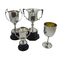 Two silver presentation trophy cups by Joseph Gloster Ltd, one other smaller cup, all on bakelite stands and an Edwardian silver goblet by Joseph Rodgers & Sons, Sheffield 1901, approx 11oz