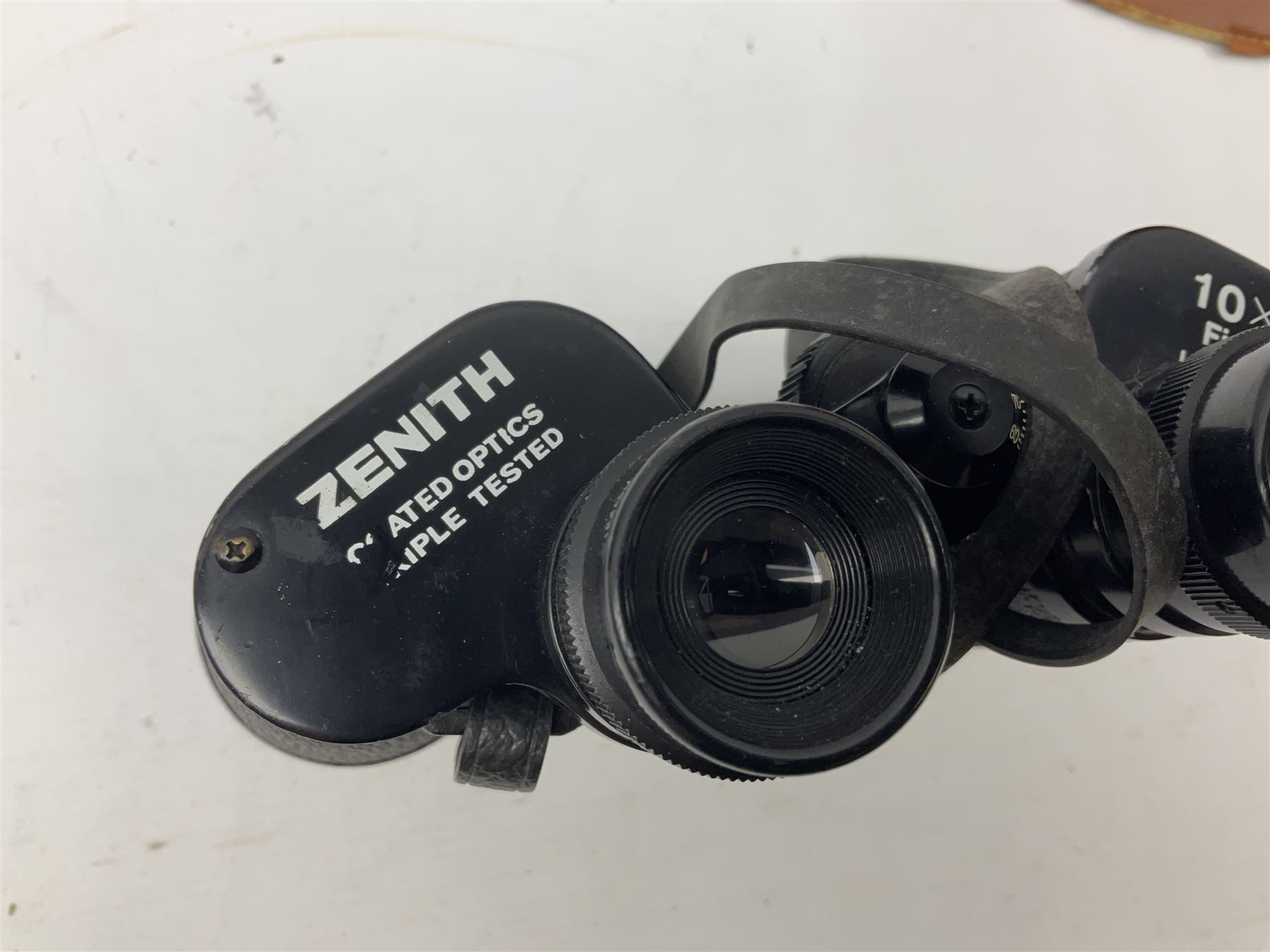 Eight cased pairs of binoculars, to include Zenith 10x50 field binoculars, Prinz 16x50, Prinzlux 10x50, Aquilus 10x35, etc, and a further binocular case