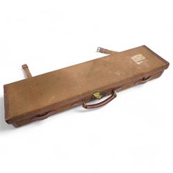 Churchill canvas shot gun case with leather corners and baize lined interior with trade label 'E J Churchill (Gunmakers ) Ltd ' with cleaning rods  and a leather 12 gauge cartridge belt