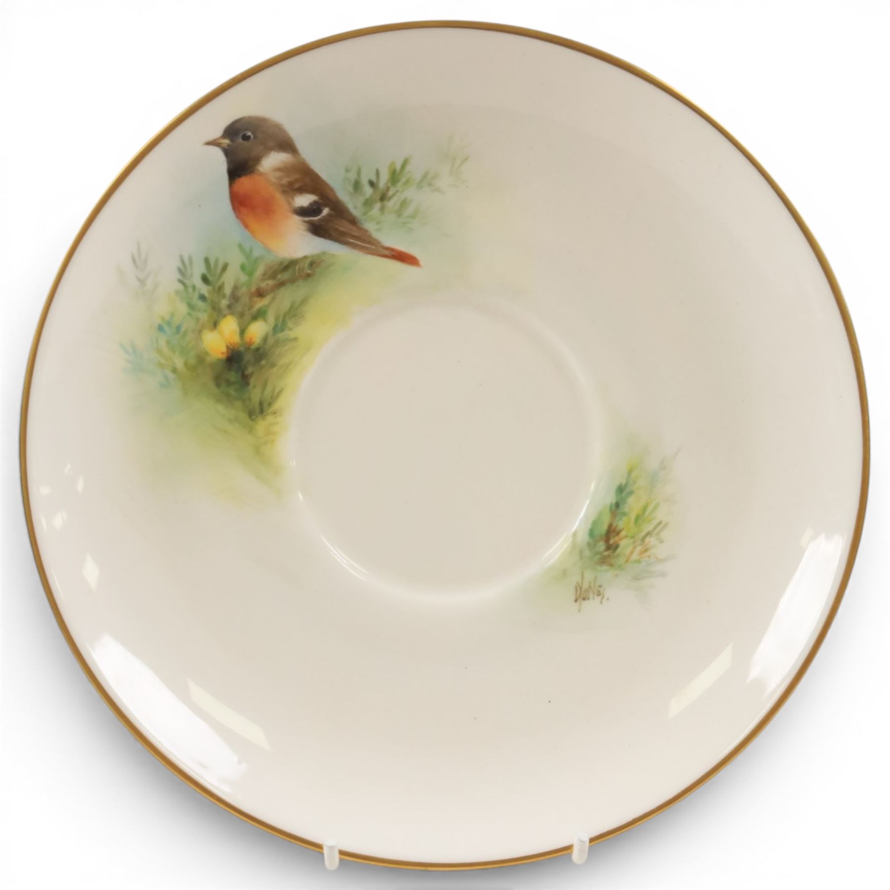 Royal Worcester large novelty cup and saucer, each hand pained, the cup with grouse, the saucer with stonechat