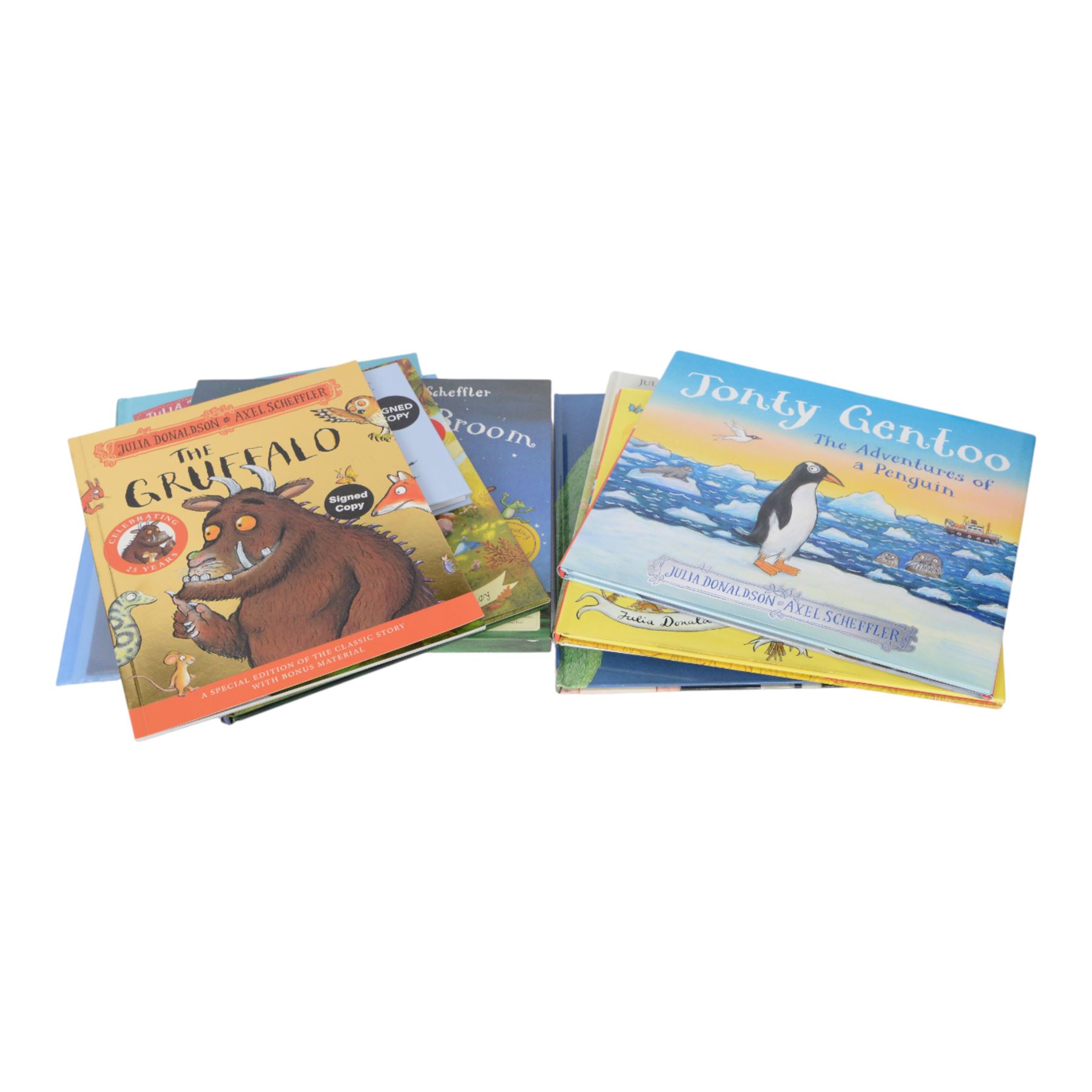 Julia Donaldson and Axel Scheffler books, comprising eleven first editions and four signed copies, including Jonty Gentoo double signed, together with two signed Julia Donaldson book plates and a signed newspaper cutting and one signed Axel Scheffler book plate