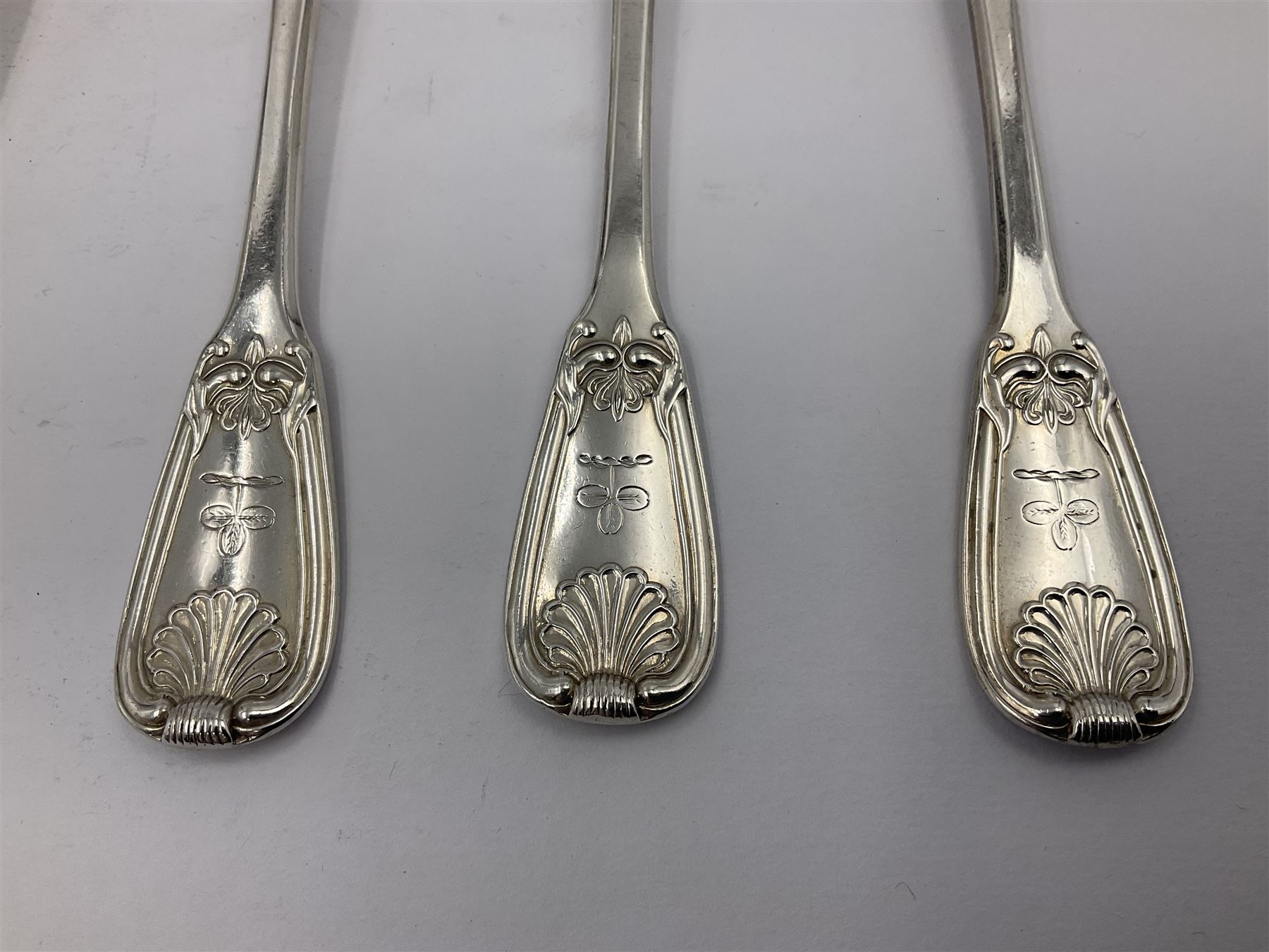 George IV Scottish silver Kings pattern cutlery for six place settings, to include table spoons, table forks, dessert spoons and dessert forks, all engraved with shamrock crest to terminal, hallmarked Robert Gray & Son, Glasgow 1833