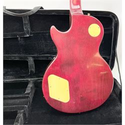 1980s Les Paul Epiphone limited edition cut-away electric guitar by Gibson, the burgundy coloured body with two pick-ups, volume and tone knobs and scratch plate, original tuning pegs, serial no.U6030215, 101cm overall; in modern Kinsman fitted carrying case