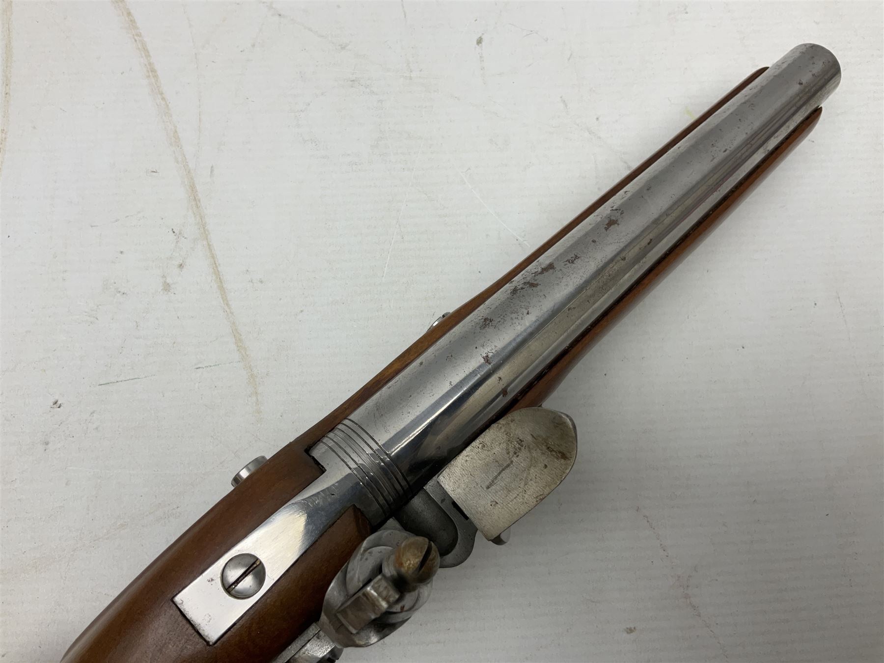 Reproduction non-firing flintlock pistol with brass skull crusher butt, the lock-plate inscribed 'Tower' and 'GR' L40cm; Sabre Japan Original Bowie Knife in sheath; and Indian embossed nickel two-piece walking cane (3)