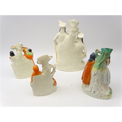  Four 19th century Staffordshire spill vases comprising Little Red Riding Hood, Robin Hood and another, H38cm (4) Provenance: From a Private Yorkshire Collector  