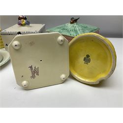 Clarice Cliff for Wilkinson Ltd Crocus Bizarre beehive honeypot painted in the Crocus pattern, together with two beehive Beswick honey pots, Poole square honey pot etc (14)