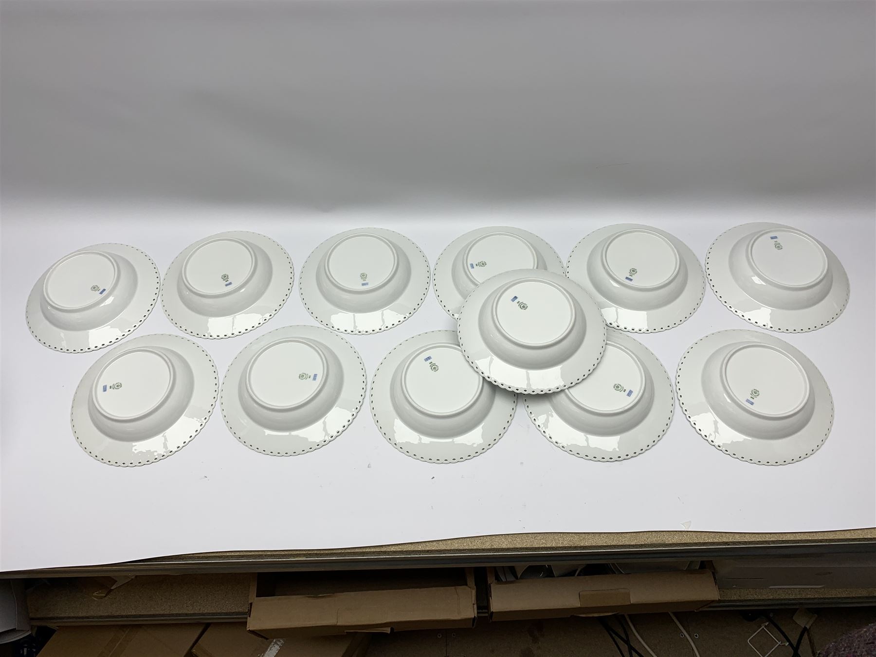 Royal Copenhagen tea and dinner service for twelve place settings, decorated in the Mega Blue Fluted pattern, pattern number 622, comprising dinner plates, salad plates, bowls with pierced rim, smaller bowls, tea cups, and saucers, dinner plates D27.5cm, salad plates D22cm