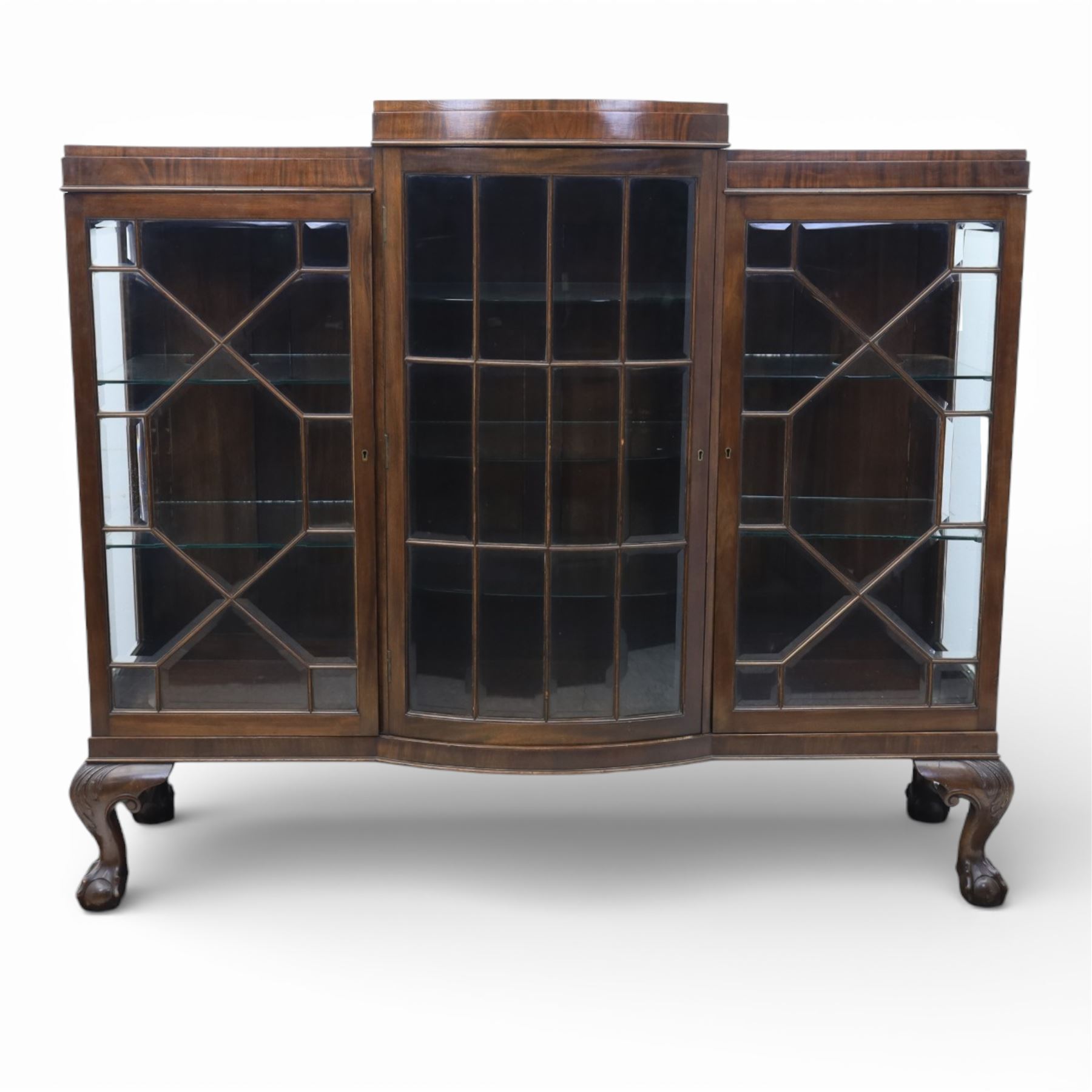  20th century large mahogany breakfront bookcase, with astragal glazed doors revealing an adjustable glass shelved interior, raised on ball and claw feet 