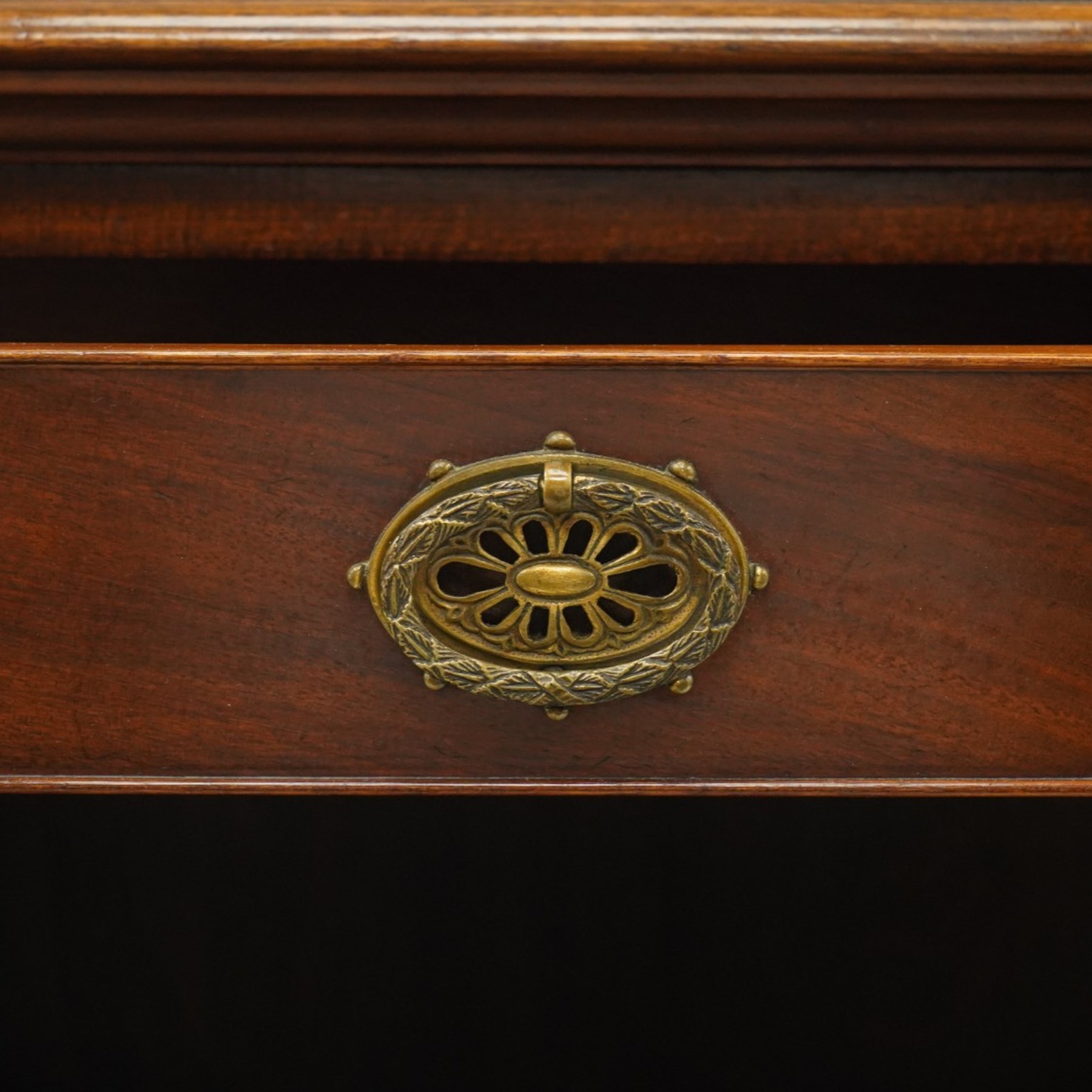 Late 19th century mahogany bookcase, fitted with two drawers over twin astragal glazed doors, enclosing three adjustable shelves, on bracket feet