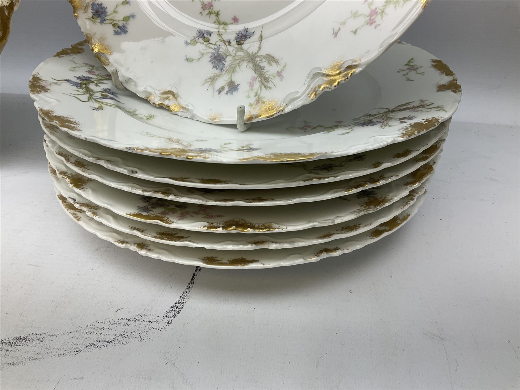 French Haviland Limoges part dinner service, decorated with floral sprays and gilding, to include two lidded tureens, thirteen plates, oval serving platter, etc, all stamped H & Co Made in France for James Green & Nephew (17) 