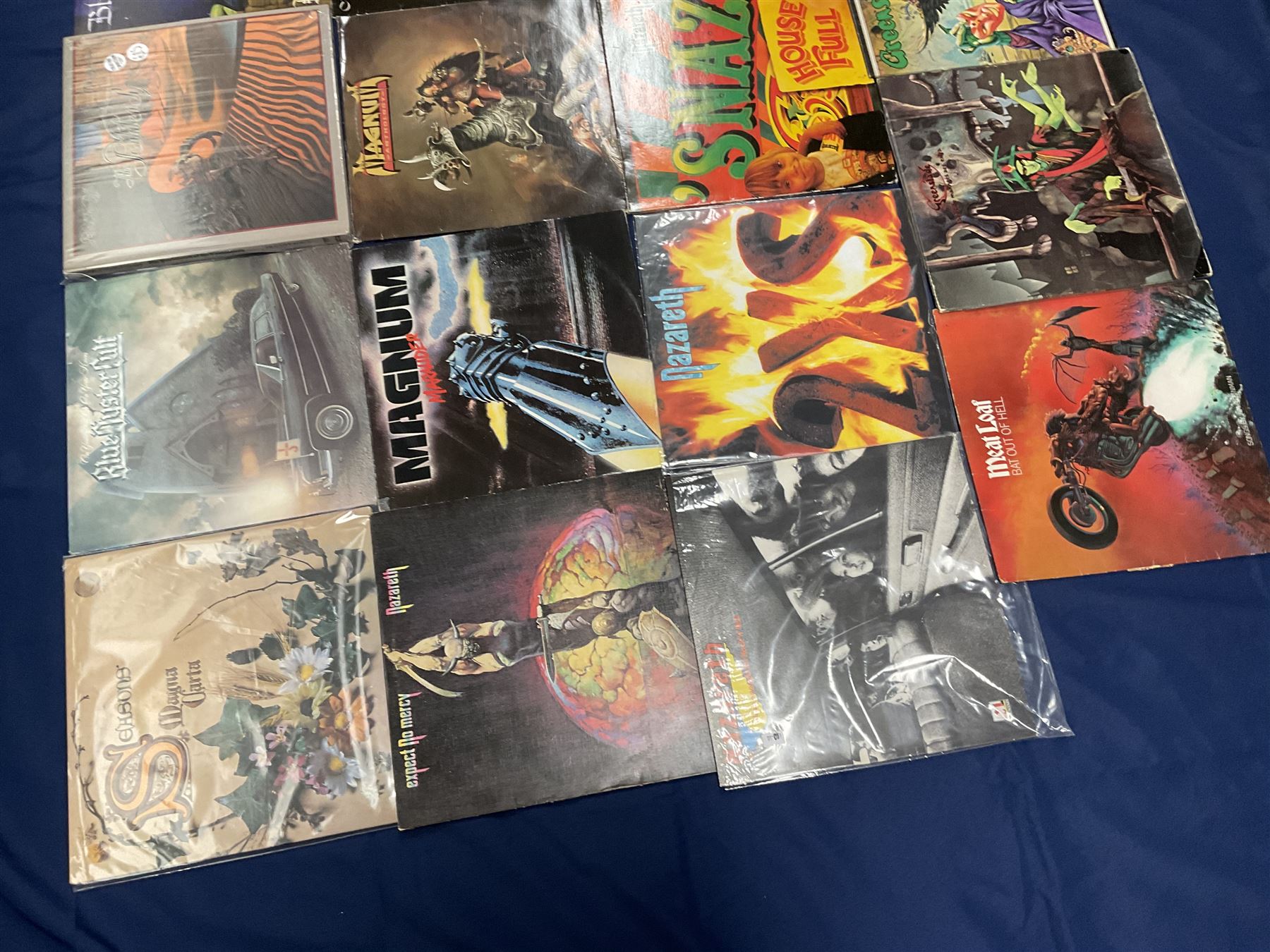 Rock, hard rock and progressive rock vinyl LPs including Greenslade 'Bedside manners are extra', 'Time and Tide', Nazareth 'No mean city', 'Close enough for Rock 'n' Roll', 'tattooed on my brain', 'Rampant', 'expect no mercy', Magnum 'Marauder', 'Anthology', 'Kingdom of Madness', 'Lost On The Road To Eternity' etc (19)