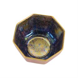 Wedgwood Fairyland lustre bowl octagonal form with mottled orange exterior decorated with gilt animals and blue purple mottled interior, together with Carlton Ware Armand lustre in Flies pattern bottle vase, vase H21cm