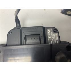 Nintendo 64 console, two controllers, games and accessories. Accessories to include the ‘Tremorpak’ and ‘Spook’ 2 Phono plugs and a S-VHS plug with adapter, both in original boxes. Games to include ‘Golden Eye 007’, ‘Doom 64’, ‘Killer Instinct Gold’, ‘Tetrisphere’, ‘F-1 World Grand Prix’, ‘Pilotwings 64’ and ‘Lylatwars’ with ‘Rumble Pak’, all with original boxes and instruction manuals. ‘Star Wars Episode I Racer’ game cartridge in Shadows of the Empire box. 