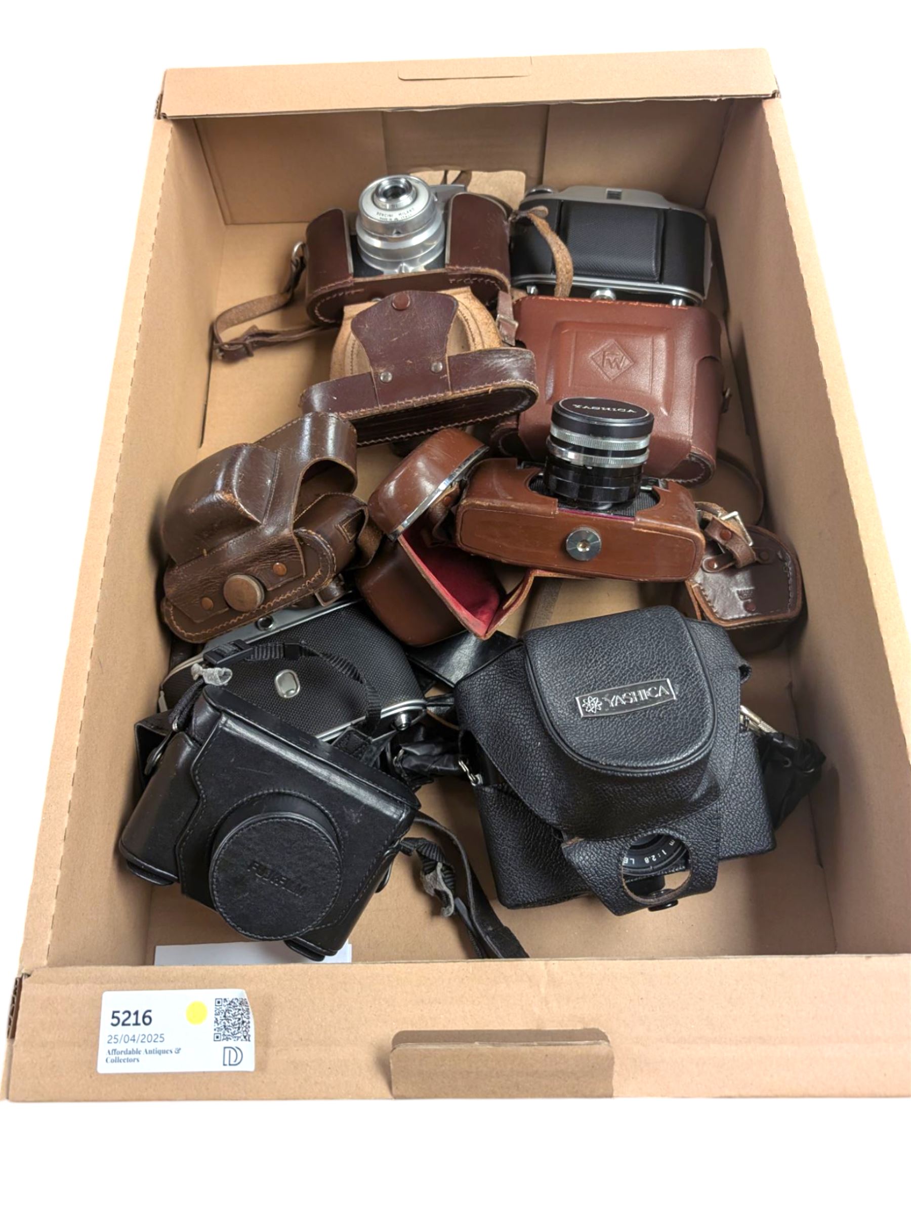 Eight vintage cameras, including Yashica MG-1, Yashica Lynx 1000, Koroll 24 S, Paxette and Fujifilm X10