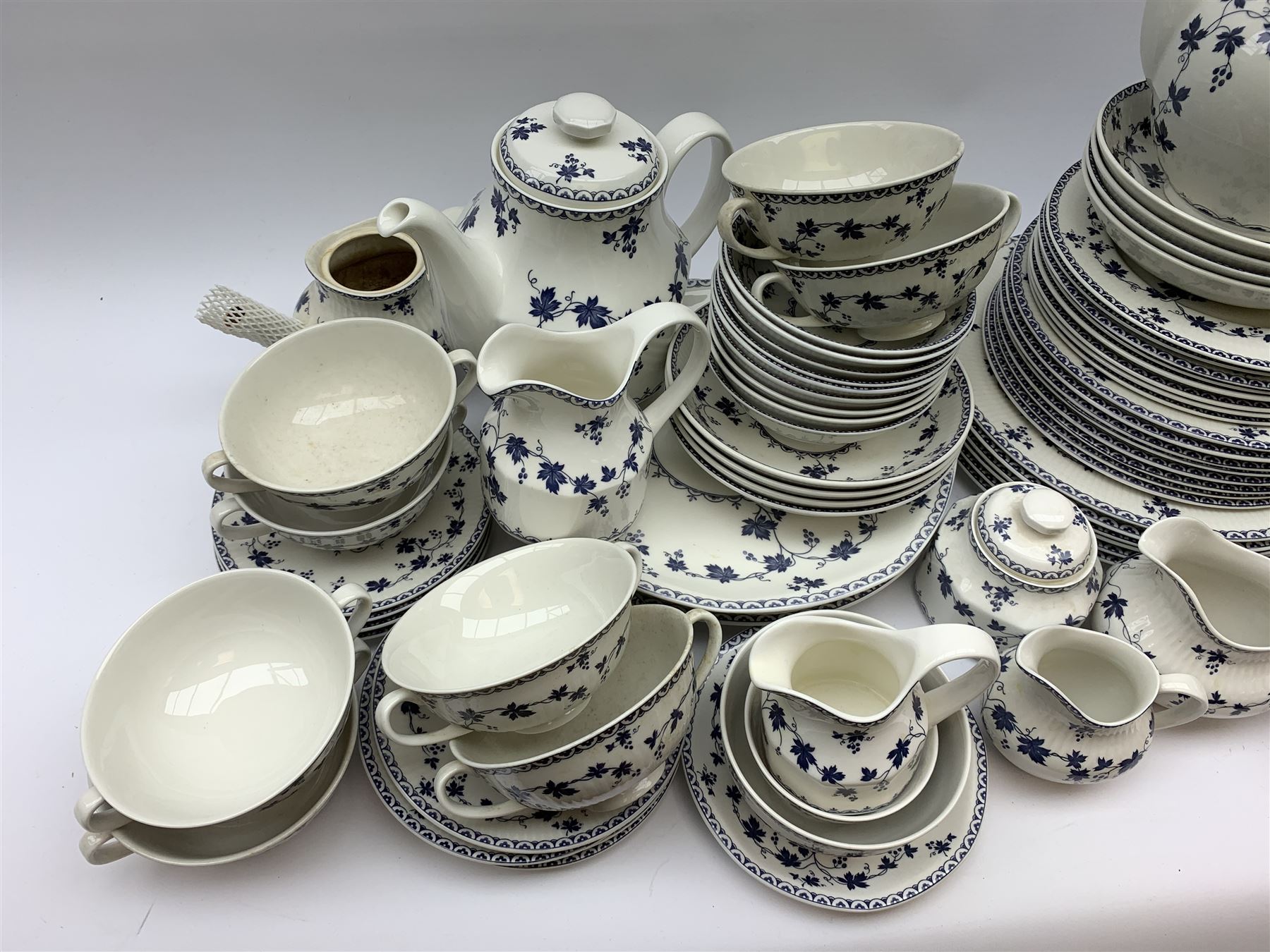 Royal Doulton York Town pattern and Hartford pattern tea and dinner wares, to include six dinner plates, eight salad plates, eight dessert plates, five side plates, eight bowls, nine smaller bowls, four serving plates, eight soup bowls, tea pot, coffee pot, various sized teacups, coffee cups, mugs and saucers, sucriers, jugs, etc. (Qty). 