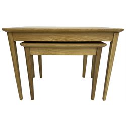 Contemporary light oak nest of two tables, rectangular top over tapering supports