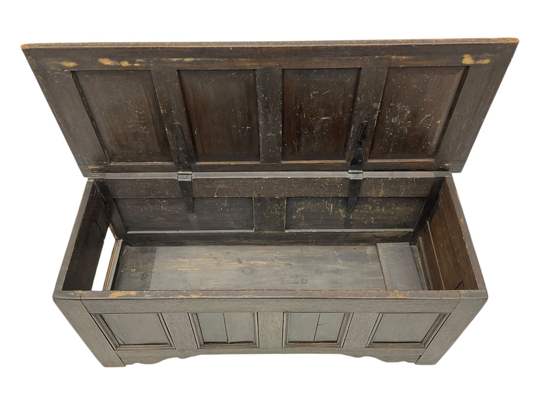 18th century design oak coffer, four panel hinged lid over four panel front, panelled sides, on stile supports with shaped brackets 