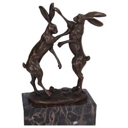 Bronze figure group, modelled as two male hares boxing, upon a naturalistic base, signed Nick, with foundry mark, raised upon a rectangular base, H24cm