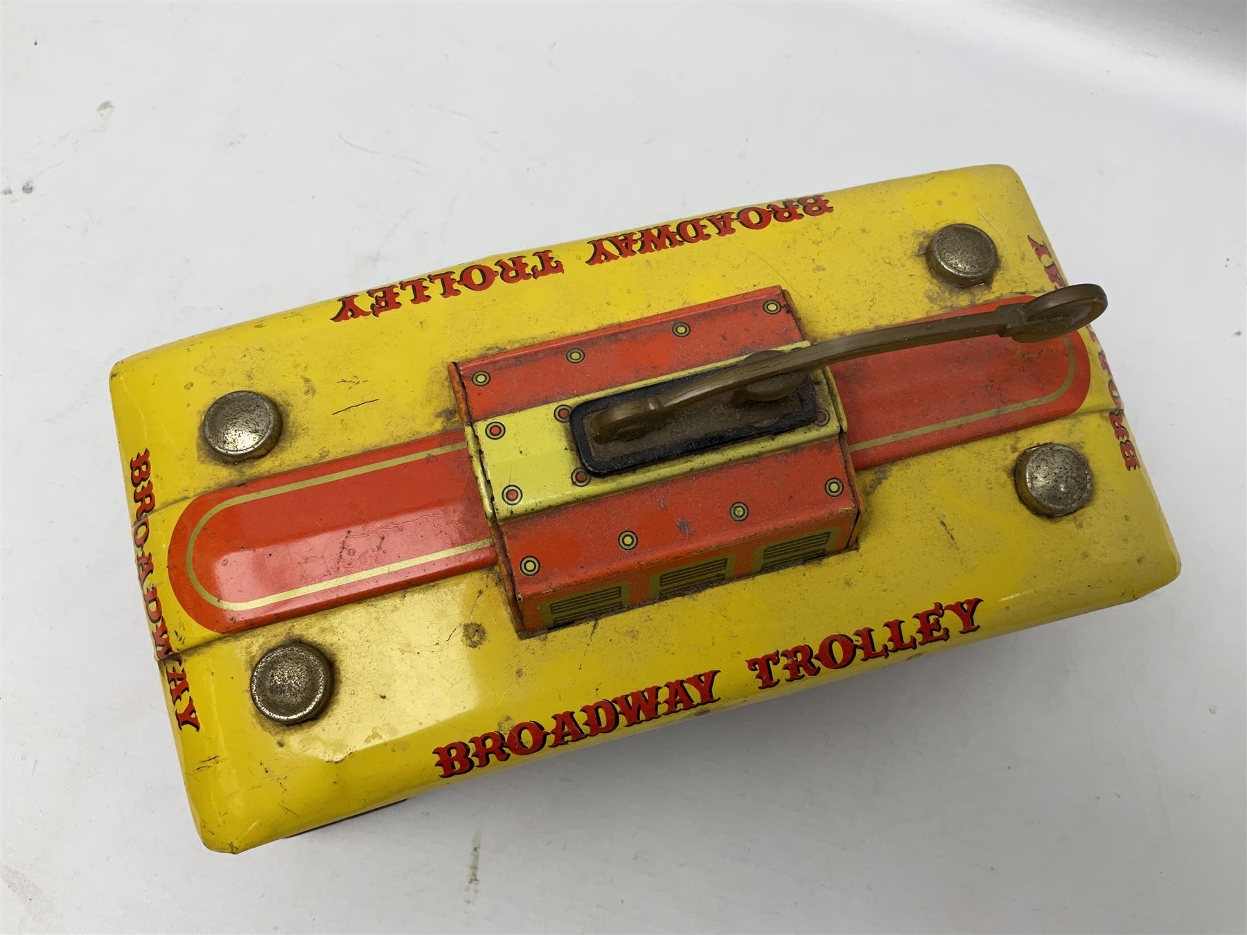 Chad Valley '0' gauge - clockwork tin-plate train set comprising LMS 0-4-0 tender locomotive No.3402 with two open wagons, loop of track and wooden signal; unboxed; and Japanese battery operated tin-plate Broadway Trolley bus No.10430