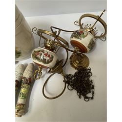 Ceramic hanging light fittings decorated with fox hunting scenes with brass fixtures, ceramic beer pulls decorated with hunting scenes and ceramic whisky barrel decorated with a pheasant