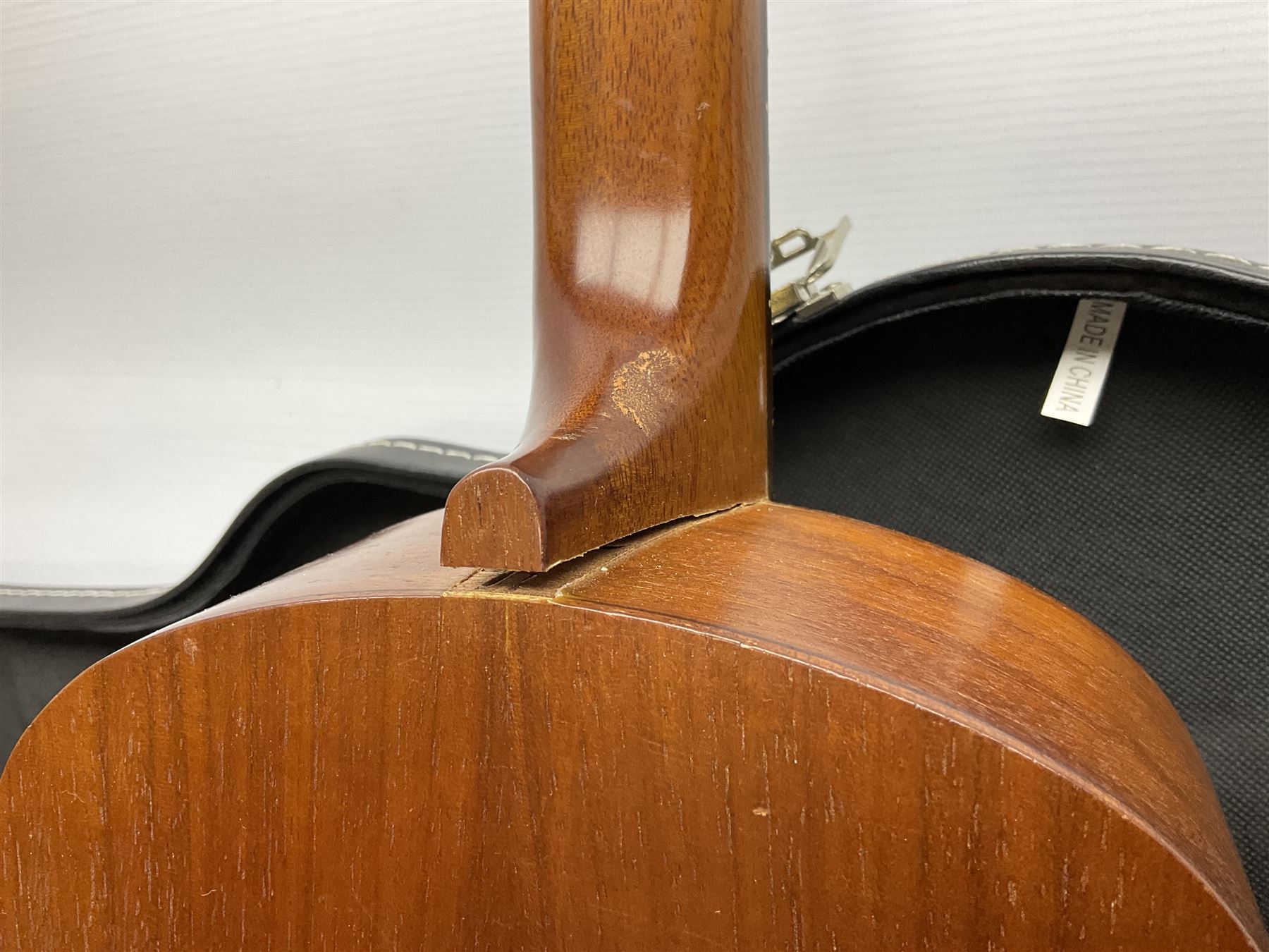 Palmer eight-string mandolin with mahogany back, simulated ivory and mother-of-pearl mounts L67cm; and Mahalo mahogany cased baritone scale ukulele, model no.U320B, L76cm; in hard carrying case (2)