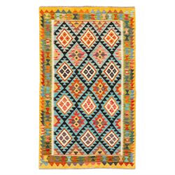 Afghan kilim cyan ground rug, the field with repeating lozenges containing geometric amber...