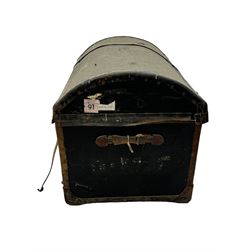 Early 20th century travel trunk, domed top with leather straps and metal rivet detailing, wooden frame with black canvas covering, interior lined with striped fabric, manufacturers mark to the inside 