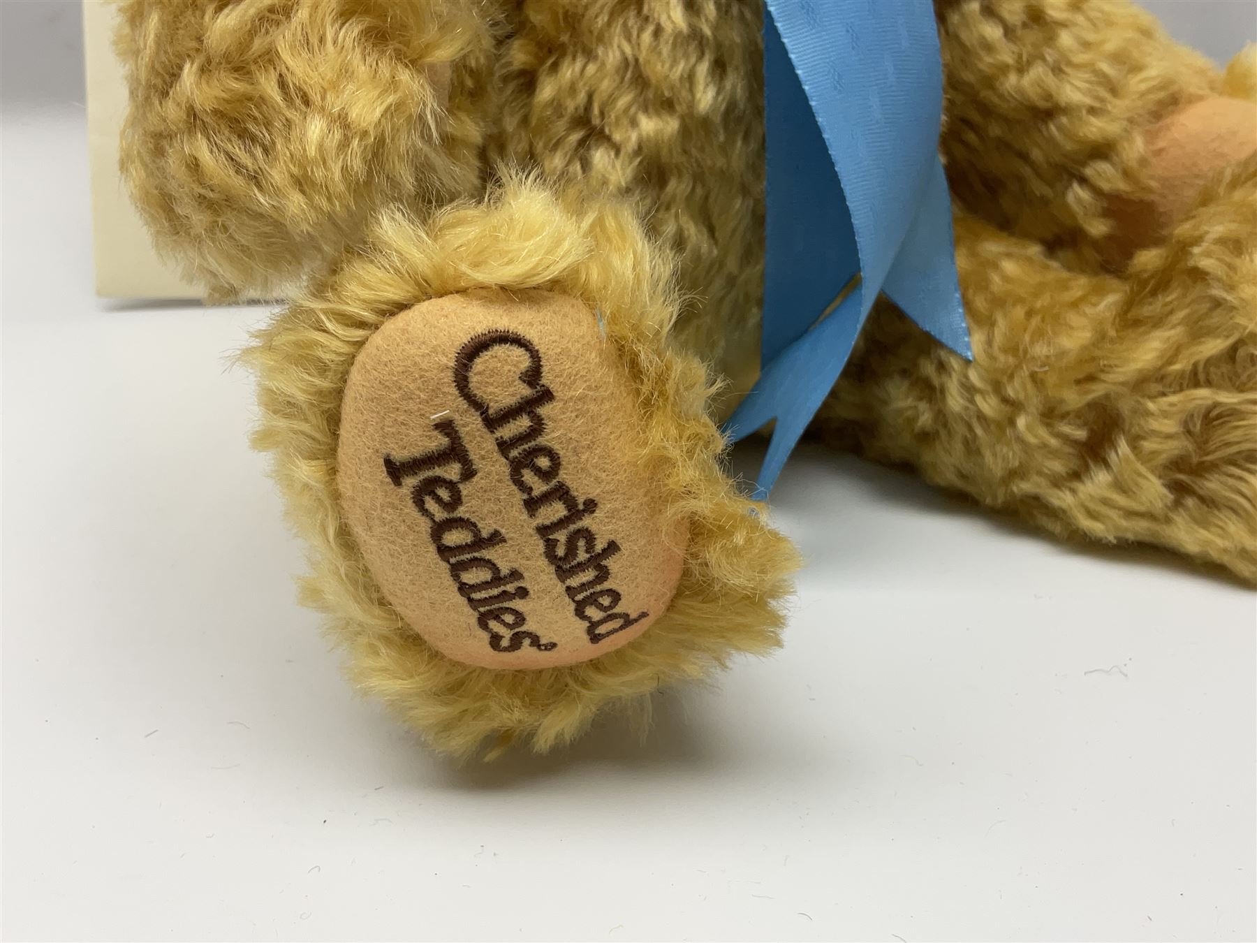 Two modern Steiff limited edition teddy bears - Prince William's 21st Birthday Bear with growler mechanism No.58/1500 H35cm; and Cherished Teddies Collection Daisy No.4269/5000 H33cm; both boxed with certificates (2)