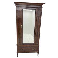 Edwardian inlaid mahogany wardrobe, projecting cornice over single bevelled mirror glazed door, drawer to base, satinwood banding throughout, on square tapering supports