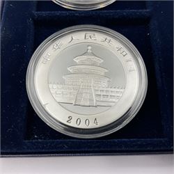 Four one ounce fine silver coins, forming 'The 2004 Famous World Silver Coin Collection', comprising United States eagle, Australian kangaroo, Chinese panda and Canadian maple leaf, cased with Westminster certificate 