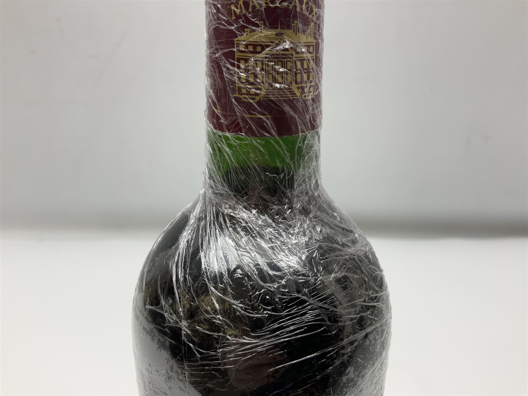 Chateau Margaux, 2003, Margaux, unknown content and proof, this bottle has depressed cork and signs of seepage