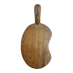 Mouseman - oak kidney-shaped cheeseboard, the handle caved with mouse signature, by the workshop of Robert Thompson, Kilburn 