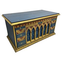 In the manner of William Burges - mid-to-late 19th century English Gothic Revival pine altar or console table, in blue and red paint with water gilding, the moulded rectangular top over six pointed arches with turned column supports, the front carved with a single row of lozenges and incised stylised motifs