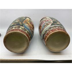Pair of Oriental floor vases of baluster form, with elongated cylindrical neck, painted with figures, upon turned wooden stands, H63cm