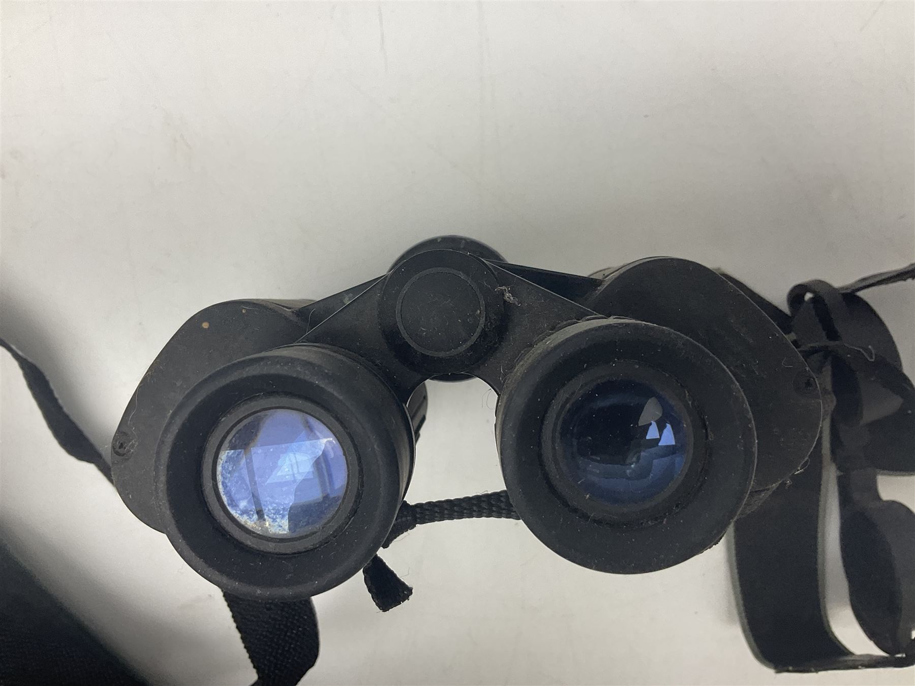 Yukon rubber armoured compact variable power spotting scope (boxed), together with Bresser 10x50 binoculars, Bushnell Excursion 10x42 binoculars, camera equipment etc  