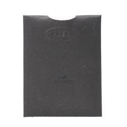 Hermès - ‘Press’ pocket torch, with orange leather sleeve