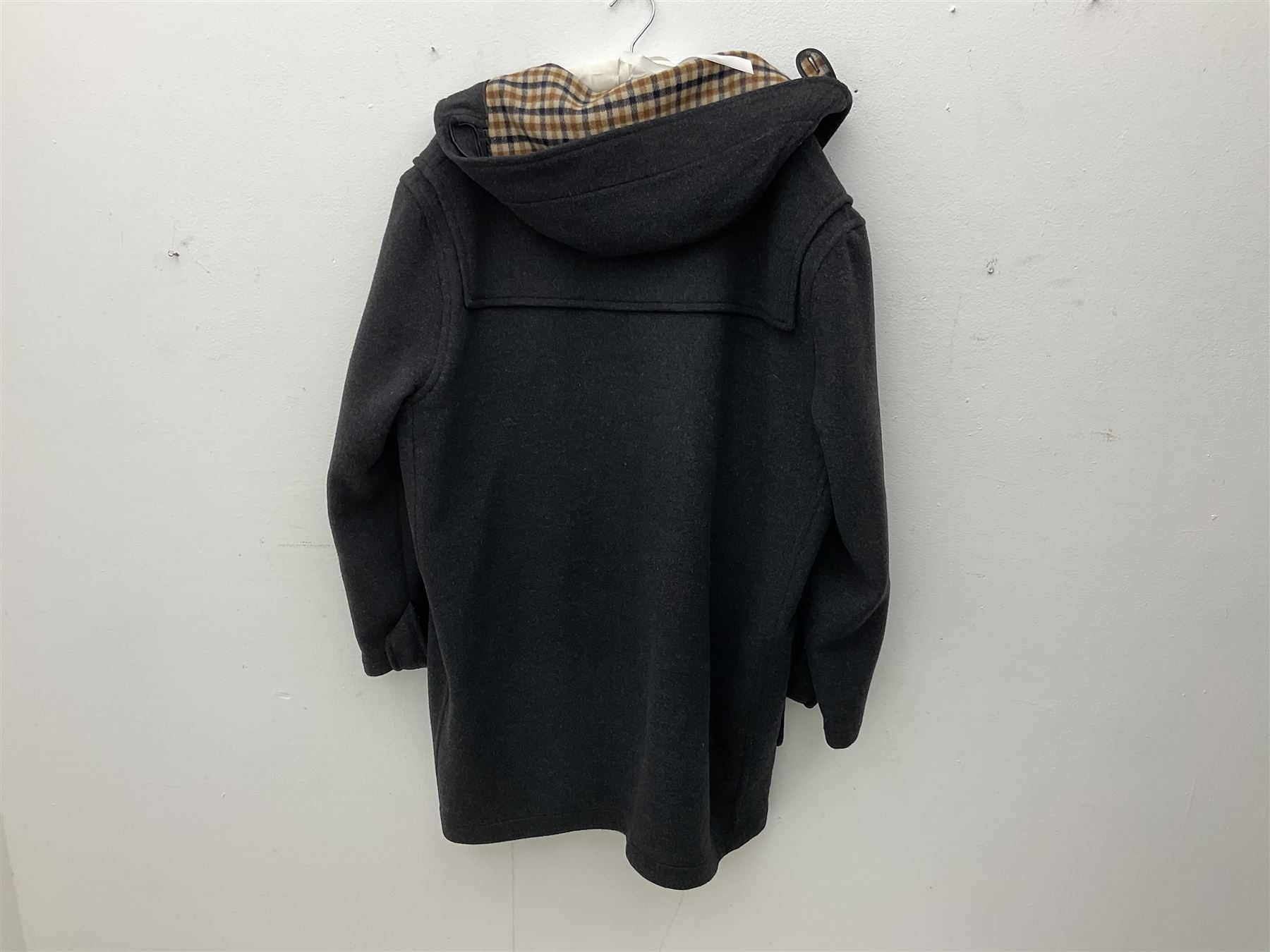 Men's Aquascutum lambs wool herringbone tweed coat with silk lining, 46 Reg, together with a further Men's Aquascutum grey wool duffle coat, with cheque lining and horn buttons, 46