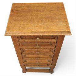 Early 20th century oak pedestal chest, with six drawers with moulded edges, raised on turned supports united by a stretcher 