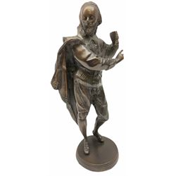 Cast metal figure of Shakespeare on a circular base H32cm.  
