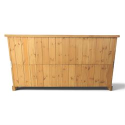 Indigo Furniture - large rustic oak combination chest sideboard, fourteen drawer with blackened metal cup handles, on a plinth base