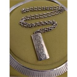 Silver ingot, hallmarked Sheffield 2000, on a silver chain, together with a silver fringe necklace