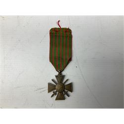 Five continental medals - WW1 Belgian Cross of Fire; WW1 French Croix De Guerre; French Croix De Combattant; French Republic Workers silver merit awarded to L. Mounet 1950; and boxed French Palmes Universitaires Officier d'Academie silver and enamel wreath (5)
