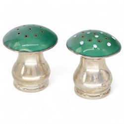 Pair of Norwegian silver and enamel salt and pepper shakers, modelled as toadstools with green guilloche enamel covers, stamped 925S Sterling Norway, H4cm