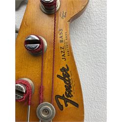 1963 Fender Jazz three-knob bass guitar; impressed with date code 7AUG63A on end of neck and serial no.L08587 on back plate; all original but re-finished in white in the 1970s; sold with photographs of the instrument in the 1960s with original finish and in the 1970s re-finished; L117.5cm; in original hard carrying case; Provenance: the professional guitar of Howard Livett from new to his death in 2005. Howard played in The Humperdincks, the backing group for Englebert Humperdinck, also played in the backing group for Max Bygraves and in the band Hedgehoppers Anonymous. The guitar is also sold with a manuscript letter of provenance from Howard's wife.