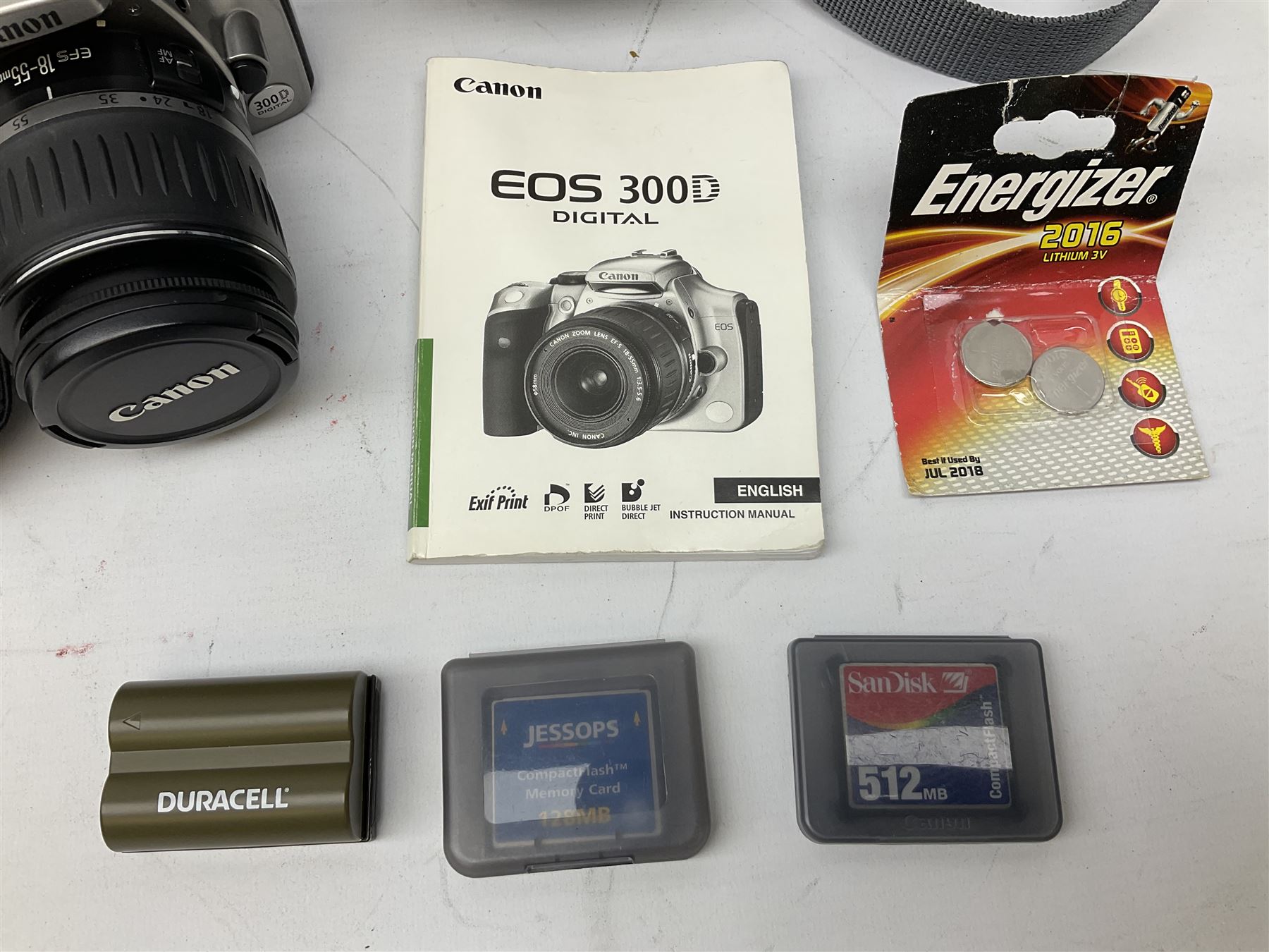 Canon EOS 300D Digital SLR in silver, with Canon 'Zoom Lens EF-S18-55mm 1:3.5-5.6', with soft shell bag and instruction manual